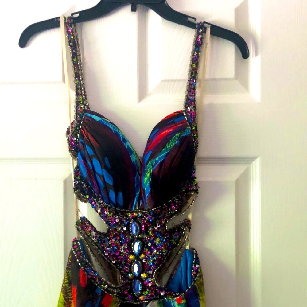 Jeweled dress with train,scarf and cut out sides and back. Size 6Jewel tones